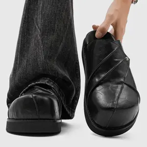 Men’s Wrinkle‑Textured Leather Cross‑Stitch Platform Mules. Vintage wrinkled leather with cross design and rivet detail delivers avant‑garde style. Thick non‑slip sole offers leg‑lengthening effect, soft for long‑time wear. Ideal for distressed denim