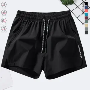 Men’s solid-color casual shorts with English letter print, zippered pockets, summer fashion drawstring athletic shorts suitable for fitness and outdoor wear, casual slightly stretchy elastic waistband drawstring shorts.