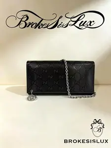 Pre-owned GUCCI Black Gloss Embossed GG WOC | Silver Interlocking GG Charm, Convertible Crossbody
