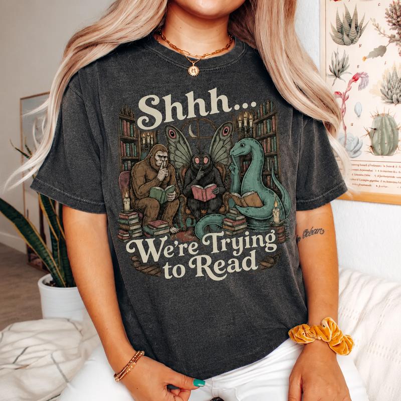 Comfort Colors Shhh We're Trying to Read T-Shirt, Cryptid Bookish Graphic Tee, Bigfoot Mothman Nessie Tshirt, Dark Academia Book Lover Gift