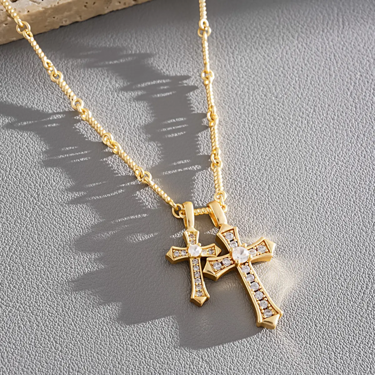 QUEENDO Dual Cross Pendant Necklace, Gold-Tone Cable Chain with 2-Size Paved Shiny Stone Charms, Adjustable Extender Chain, Affordable Layerable Faith-Theme Costume Jewelry for Daily Wear & Gifting