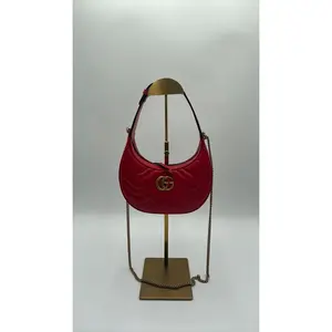 Pre-owned GUCCI Leather Luxury Bags & Accessories Gg Marmont Matelasse Mini Half Moon Hobo bag, Red Date Code: 6995140416. Entrupy ID: T4D8VMJ.