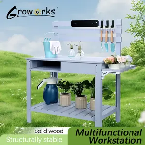 Groworks wooden workbench with small potted plants on the side, outdoor garden storage workbench