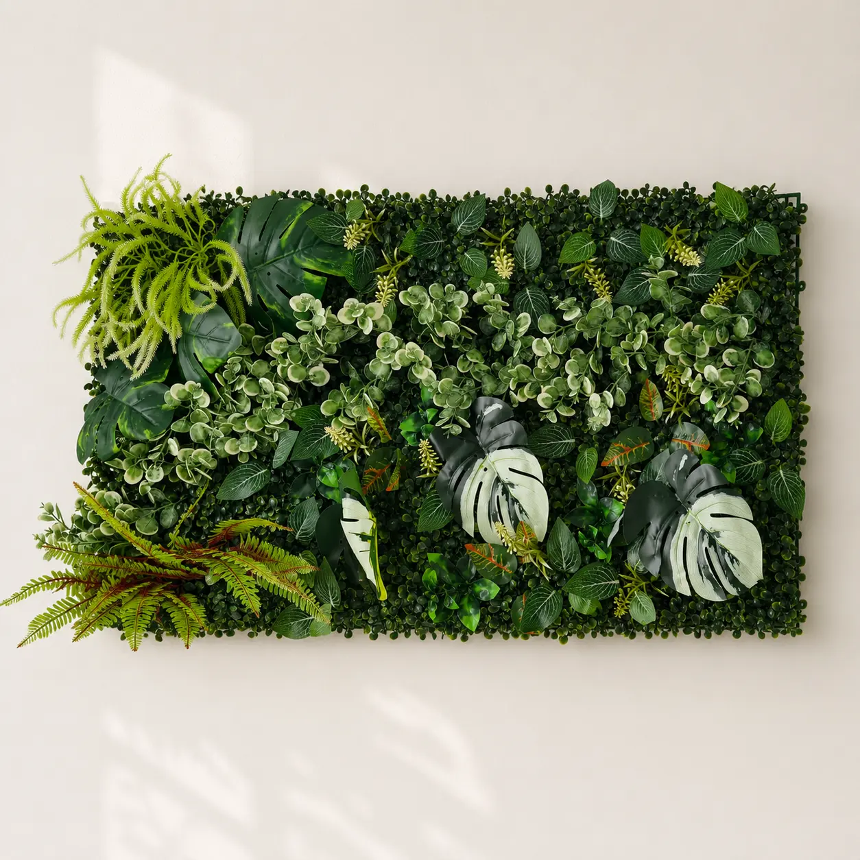 39.4 x 19.7 Inch Artificial Plant Wall Panel, 2.5lb, PE Lush Mixed Faux Greenery with Monstera Leaves and Fern Accents, Decorative Green Wall Backdrop for Home, Office, Garden, Patio and Event Decor, 1 Panel
