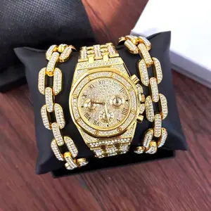 Gold dial, 3 small chronograph dials, gold round bezel, gold strap, diamond-set watch.