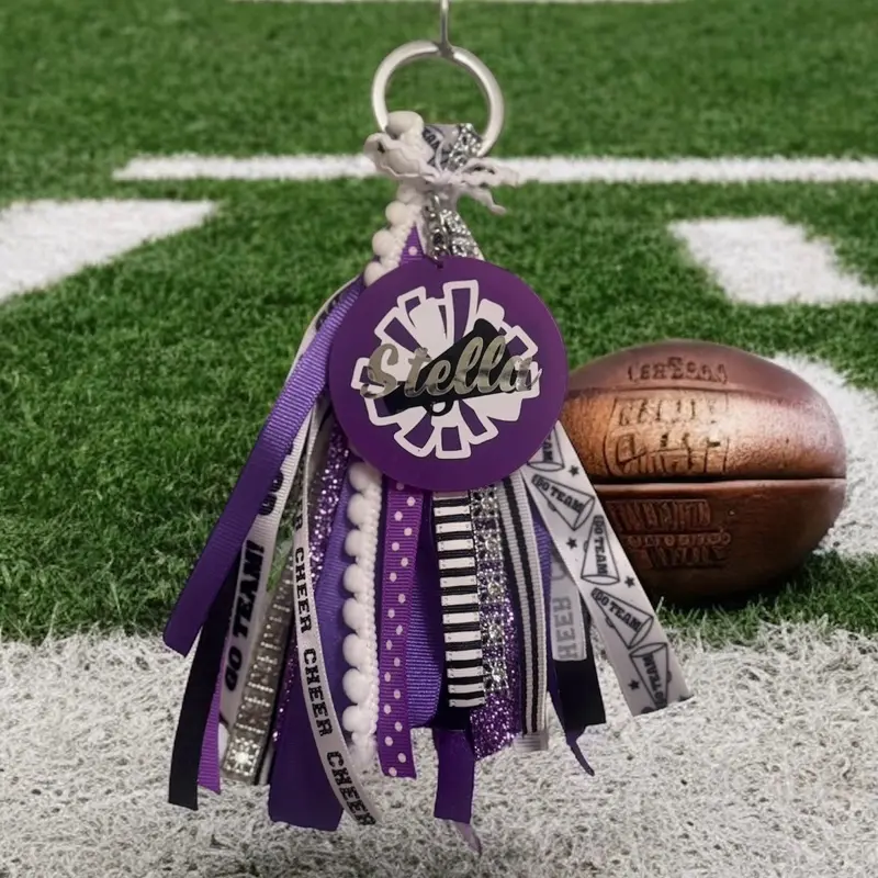 Cheer Bag Tag with Purple and Black Ribbons and Pom Poms for Cheerleading Accessories