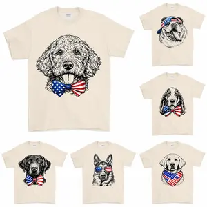 Puppy Love Dog T-shirt Showcasing 50 dog breeds in 4th of July Graphic Sand Color, Cute Puppy Independence Day Shirt for Dog Lovers, printed on a cozy Gildan unisex crew pullover for pet lovers.