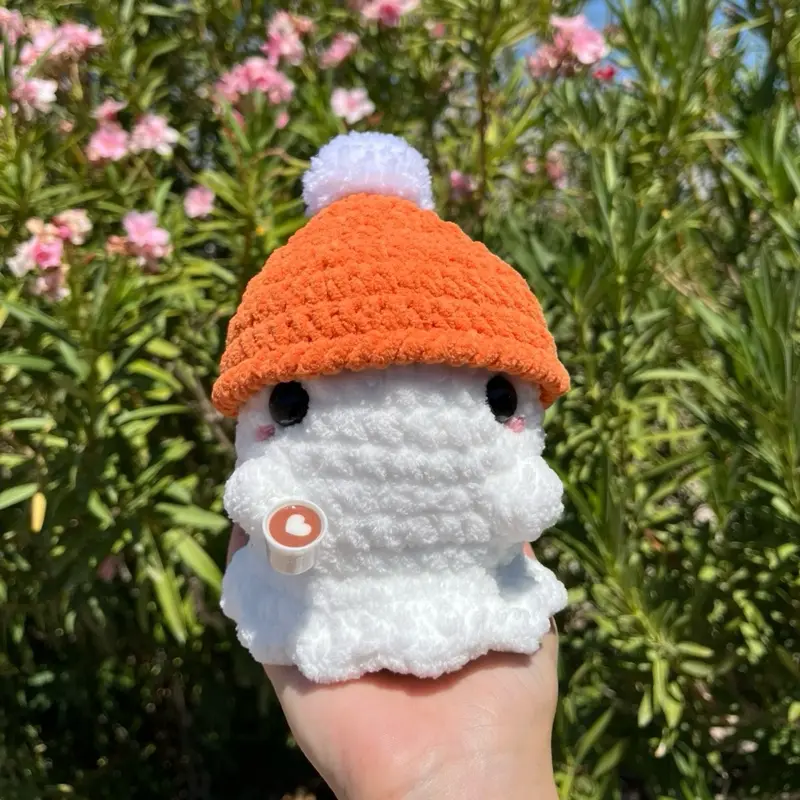 Handmade crochet ghost with coffee and beanie