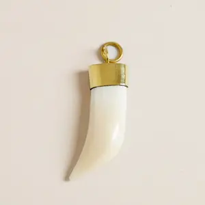 Elegant Horn Pendant - Timeless Design with Brass Accents - Approximately 2" x 0.5" - Natural Horn Material - A Piece You'll Love