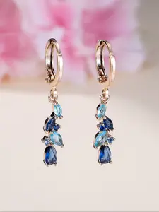 Fashionable, stylish sapphire blue teardrop cubic zirconia gold-coloured ladies' earrings. Classic, versatile jewellery designed especially for women. Party accessories. Birthday gifts.