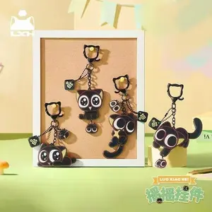 Cute little black cat key fob with a charming swinging accessory  a perfect gift for friends.