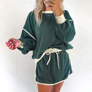 Evergreen Color Contrast Loose Pullover and Lace-up Waist Skort Set