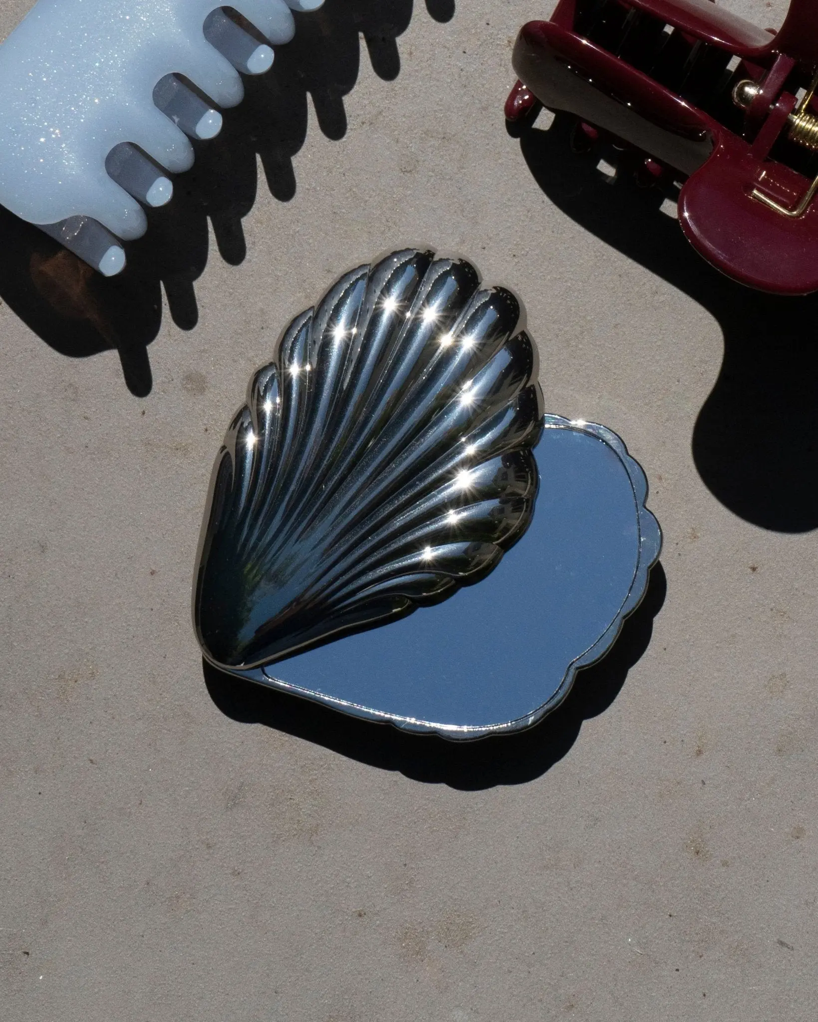 THE SILVER SEASHELL TOUCH-UP MIRROR