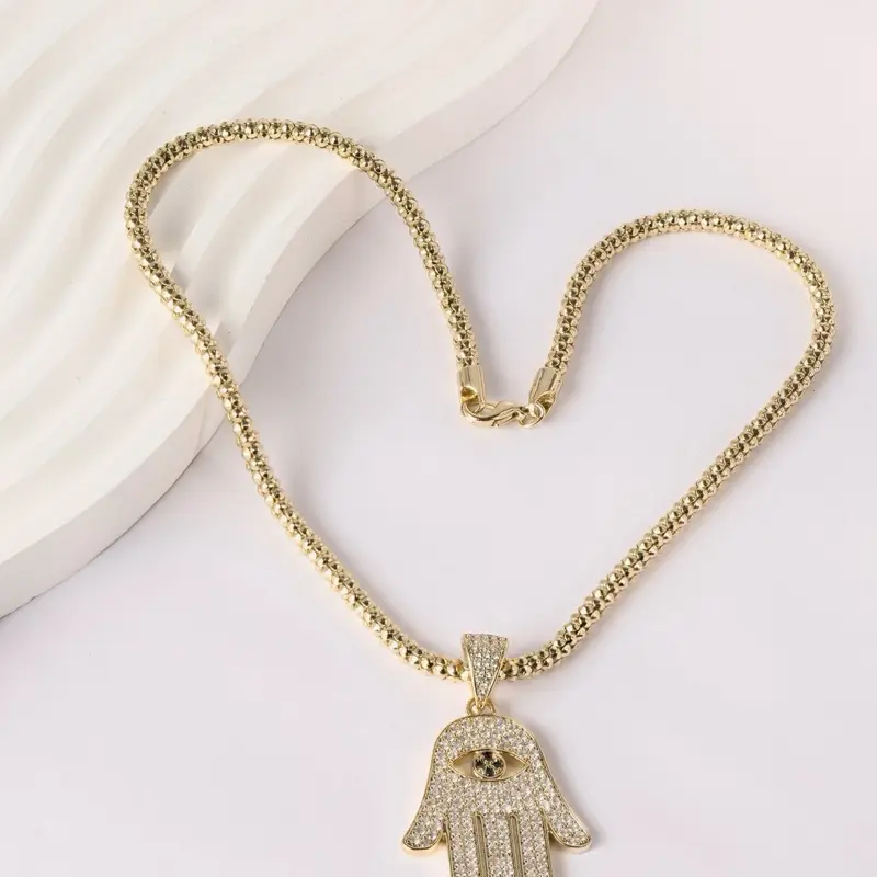 Iced Hamsa Hand Evil Eye Pendant 14K Gold Plated 50mm x 30mm with 16” 4mm Chain for Jewelry Enthusiasts