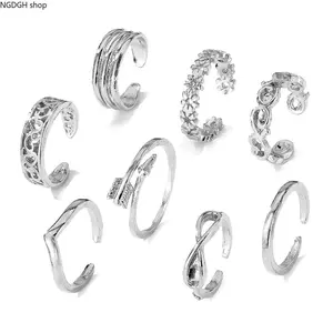 Women's Trendy Gold Toe Rings - Mixed Styles with Infinity, Heart Shapes, Arrow, Twisted Band Designs, Stackable Mix and Match, Shiny Lightweight Waterproof, Ideal for Summer Beach Vacation & Daily Wear