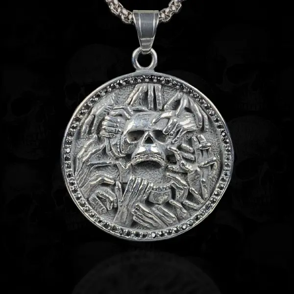 Grasping Hands Skull Necklace