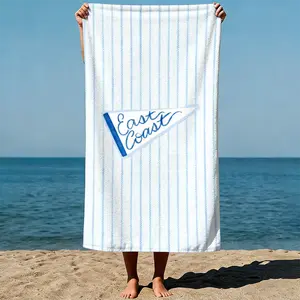 Pentagon-shaped sticker with “East Coast” text on striped fabric, hand-drawn illustration style. Sand-Free Beach Towel | Ultra-Light Microfiber | Quick-Dry, Compact for Travel