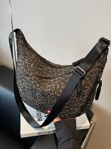 Fashionable Leopard Print Crossbody Bag for Women, Multi-Pocket Functional Jigsaw Backpack, Versatile Shoulder Bag for Daily Use, Trendy Commuting Bag