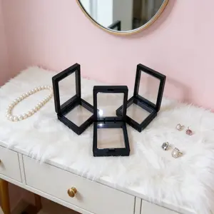 Display Case for 30 Small Exquisite Black Items Product Features: 3D floating design, dust-proof plastic, with elastic film, high transparency and gloss Applications: Leaf specimens, insect specimens, jewelry storage, etc. Model: DM033