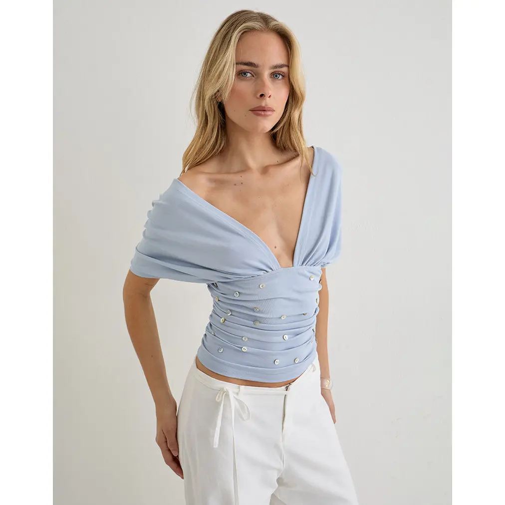 Vernia Plunge Batwing Top in Lyocell Dusty Blue with Pearl Buttons