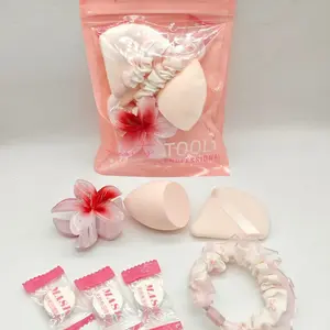 7-Piece Sakura Pink Beauty Tool Set- Slanted Makeup Sponge, Triangle Velvet Powder Puff, Plumeria Hair Claw, Ruffled Scrunchie with Free Compressed Masks