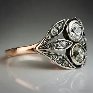 An Edwardian-style vintage court ring featuring an old European cut, exquisite openwork leaf design, and large synthetic zirconia stones. This beautiful engagement ring embodies a luxurious yet understated antique jewelry aesthetic.The  gift for her.