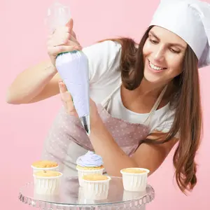 Piping bag and nozzle set, 11.8 inches, 100 explosion-proof piping bags, 124-piece cake decorating kit including 16 piping nozzles, 1 reusable piping bag, 3 cake spatulas, 2 converters and 2 piping bag tiebacks.