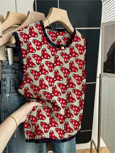 One piece + Women's spring/summer loose-fit round-neck sleeveless knitted top, perfect for laid-back back-to-school style. Features contrast dark blue trim, leafy prints with red bow accents. Ideal for outdoor wear - throw on a vest or rock it solo!