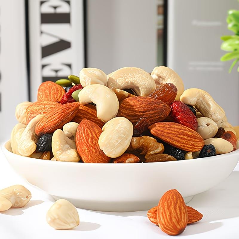 Mixed nut pieces (hazelnut, almond, cashews, walnut, dried grapes, dried cranberries); gluten-free snack; energy boost before and after workouts; low sugar, high protein; crunchy and tasty; individual small packaging for office snacks.