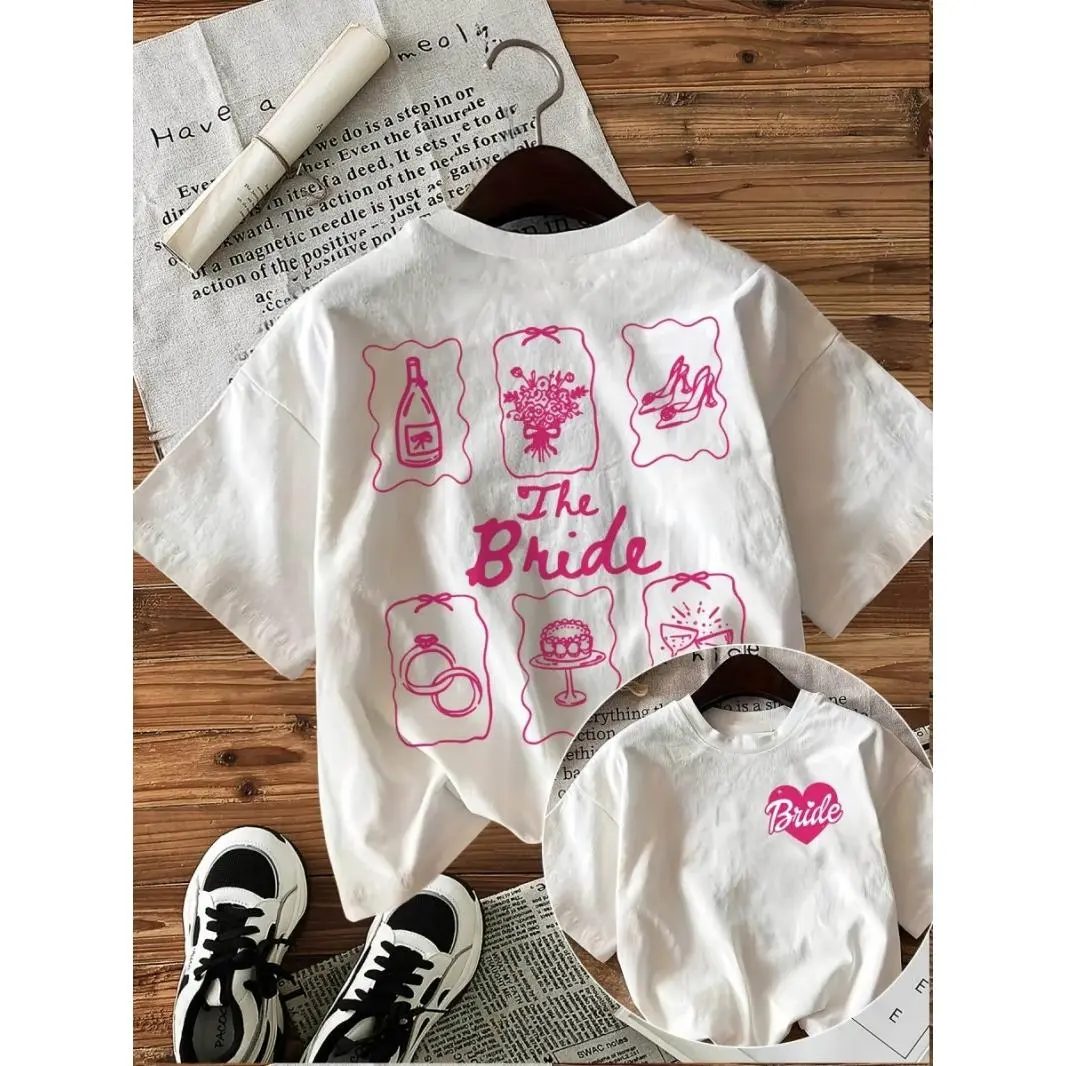 Bride Graphic Tee White Crewneck Short Sleeve Wedding Shirt With Champagne Bouquet Heels Rings Cake Print Cute Bachelorette Party Bridal Shower Outfit Gift