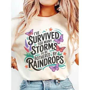 I've Survived Too Many Storms to Be Bothered by Raindrops ~ Unisex Apparel Printed In The USA!