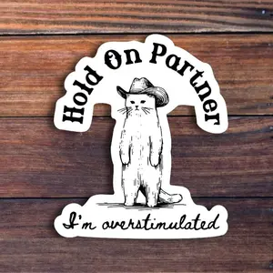 Hold On Partner, I'm Overstimulated – A funny cowboy cat sticker with western vibes! Perfect for laptops, water bottles, journals