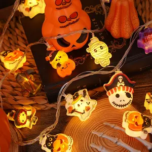 Halloween jack-o'-lantern toys, skulls, small string light decorations, bar shopping mall event scene decorations, prop ornaments