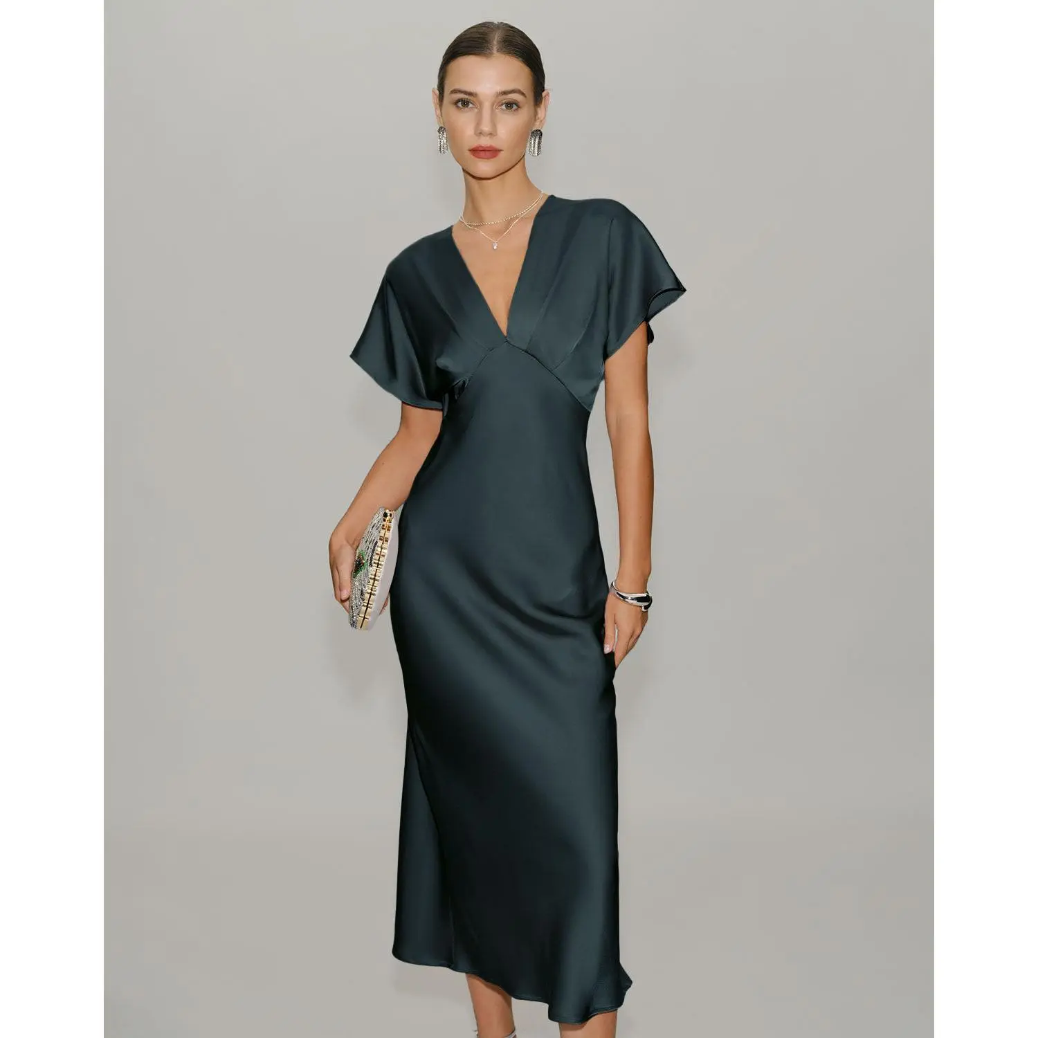 amanda uprichard sandrine silk halter dress Amanda Uprichard Aurela Halter Gown in Jungle – Suite 201 main image 0
