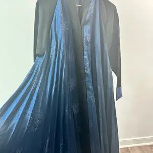Pleated Umbrella Abaya Elegant Blue Design with Detailed Embroidery and Soft Material for Comfort
