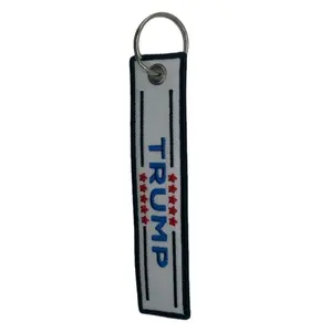 Trump KeyTag/Keychain - Featuring "TRUMP" Design, Keyring Attachment, White Background with Blue Text