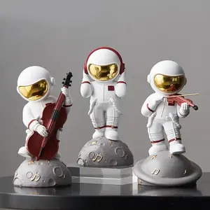 Tchaptchet Home Astronaut Figurine Home Decor, Resin Astronaut Statue with Musical Instruments, White and Gold, 4 Designs Available