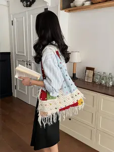 This multi-functional casual woven shoulder bag comes in 13 color-block designs, featuring a striking color combination, large capacity, and is a new spring style. It's a simple yet artistic women's handbag.