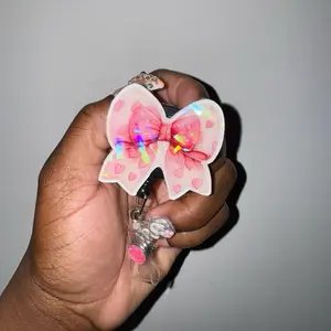 Pink heart bow  badge Reel