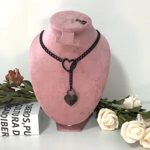 Heart Lock Slip Chain Necklace with Heart O-Ring Punk Rock Cuba Long Necklace on Pink Velvet Stand
