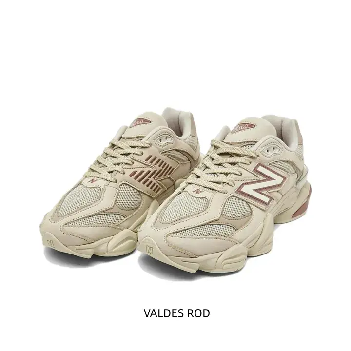 Premium cream and beige athletic sneakers featuring breathable mesh panels and durable suede overlays. Retro chunky runner design with cushioned soles for all-day comfort.