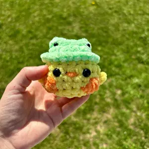 Crochet duck with frog hat
