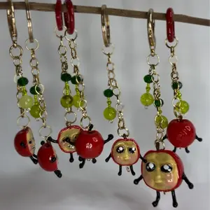 Smirky Apple Figurine Keychain - Love and Deepspace Inspired - Caleb Apple Merch