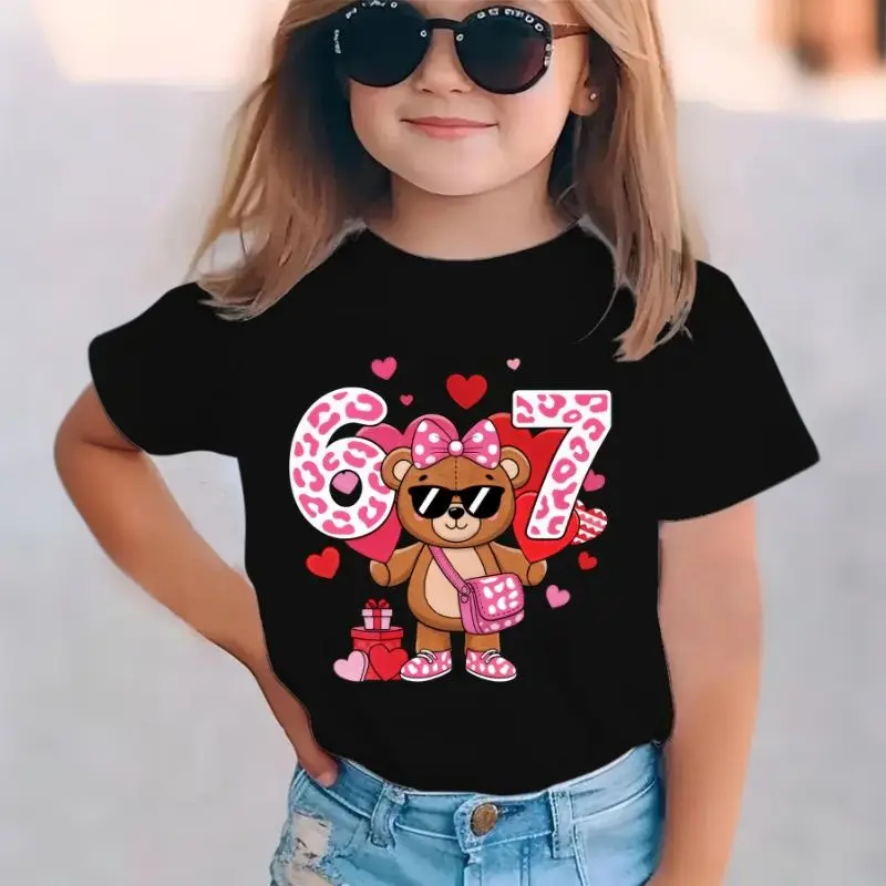 Girls' Summer Fashion Graphic Tee - "Bear in 67 and Heart Balloons" Cartoon Print, Crew Neck, Short Sleeve, Regular Fit, Slight Stretch Cotton Top, Girls Clothes for Kids, Fashion Tee for Daily Wear, Cotton Graphic Tees
