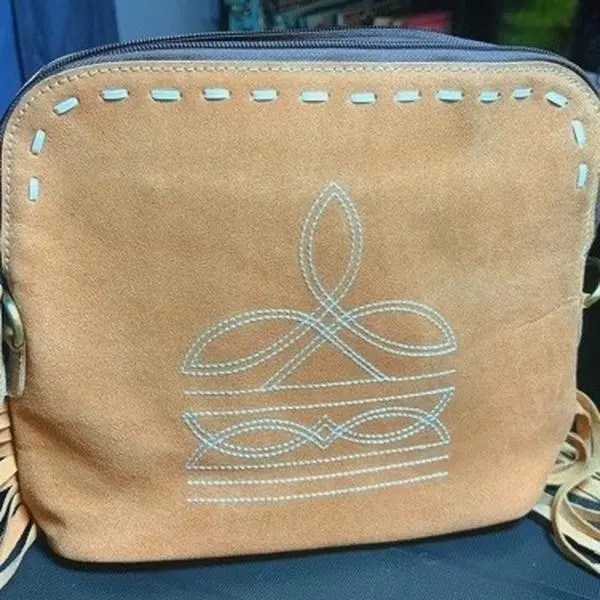 Tan boot stitch crossbody bag