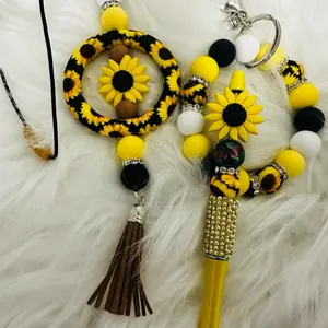 Sunflower Car Charm Wristlet and Pen Set - Black and Yellow Design with Sunflower Charm, Includes Wristlet and Pen, Perfect for Sunflowers