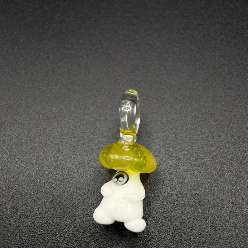 Handmade yellow mushroom character glass pendant