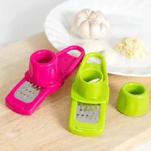 Manual Garlic Press Peeler Tool Multi-Function Ginger Crusher Mincer Kitchen Gadget for Chopping Grinding Slicing Vegetable Grater
