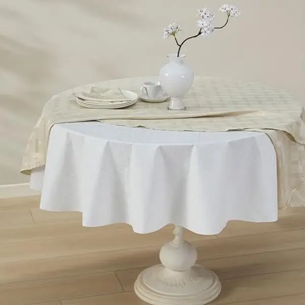 Newbridge Quilted Waterproof Cut to Fit Table Pad Protector with Flannel Backing, Heat Resistant, Wipe Clean, Cushioned Pad Protects Table from Spills and Scratches 52 inch Round