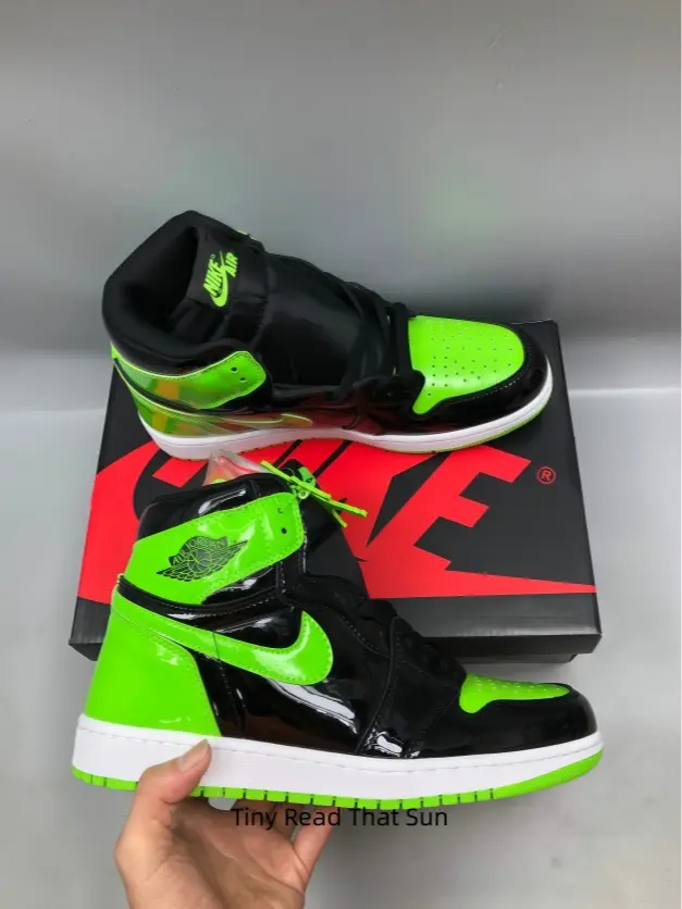 Glossy patent leather high top basketball sneakers, retro court kicks with neon contrast panels and perforated toe box for bold streetwear fits